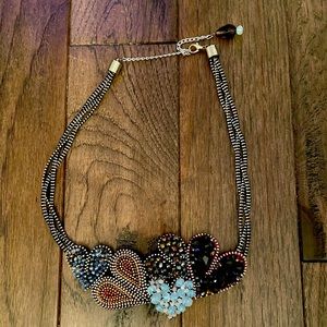 Beaded necklace with metal clasp